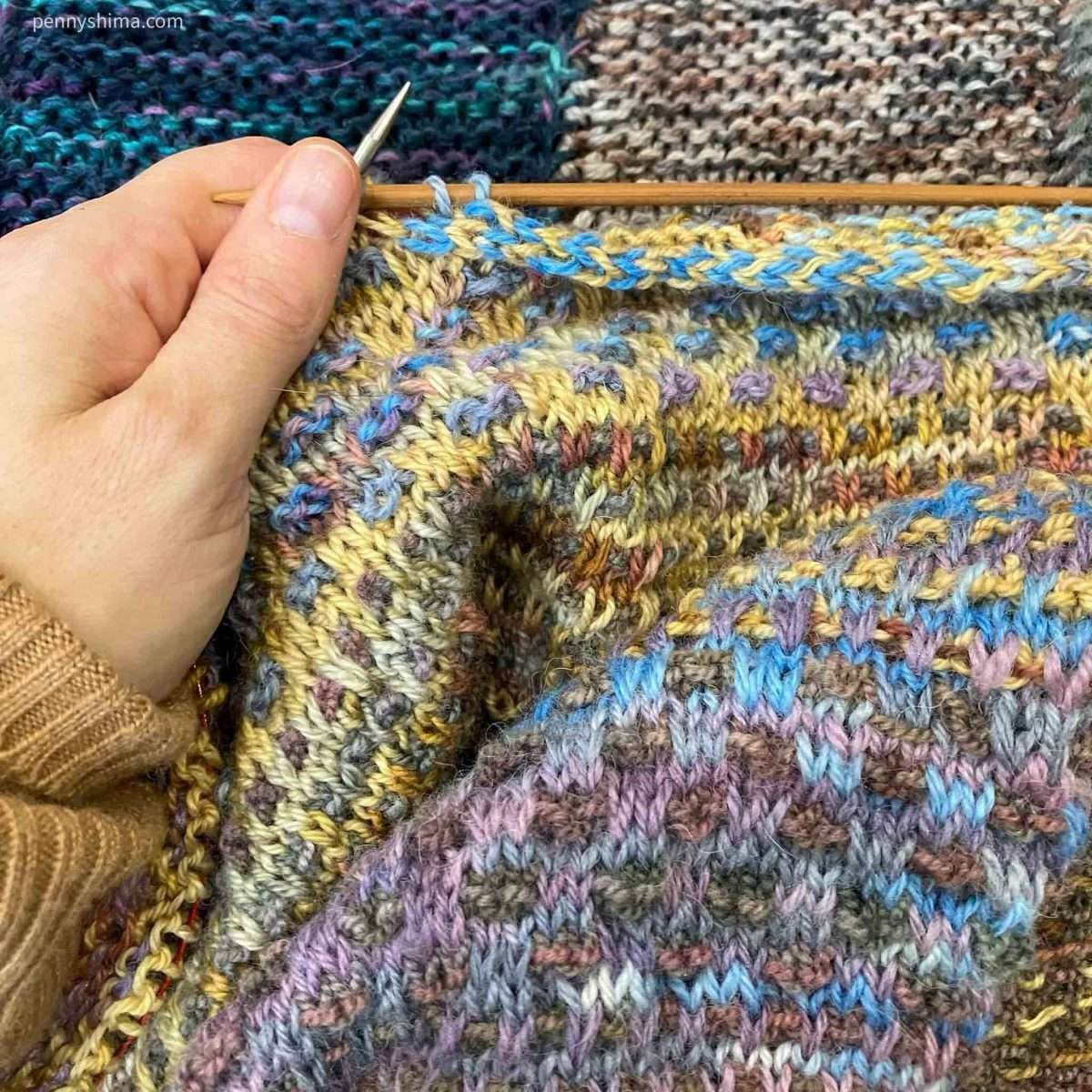 Shift cowl icord bind off in progress.