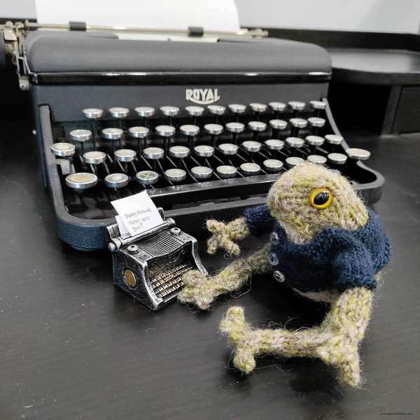 frog posing in front of a "typed" letter, "Dear Friend, How are you?" in front of a Royal typewriter