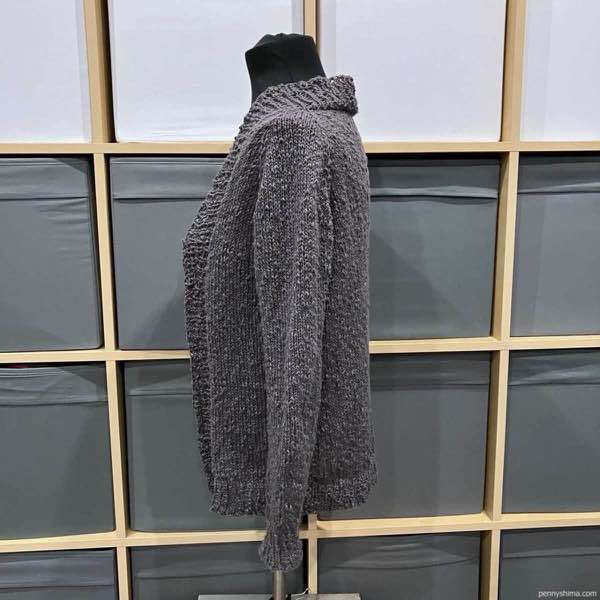 grey cardi from side on dress form