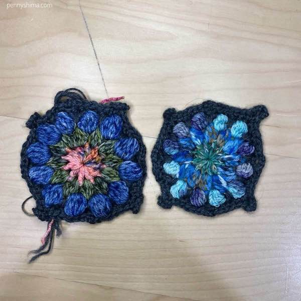 completed crochet motif in dc and hdc shown on a light wooden background