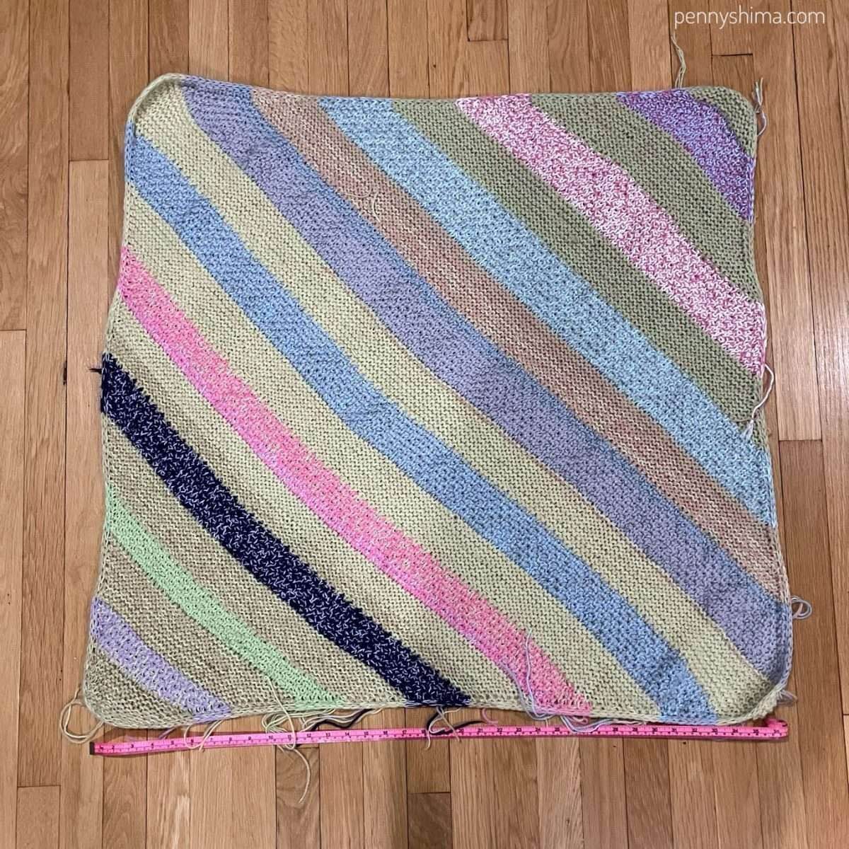 Finished blanket unblocked on a wooden floor